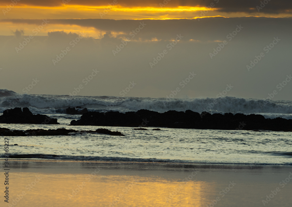 Obraz premium Beautiful beach cloudy sunset in Caminha outskirts, Viana do Castelo district, Portugal