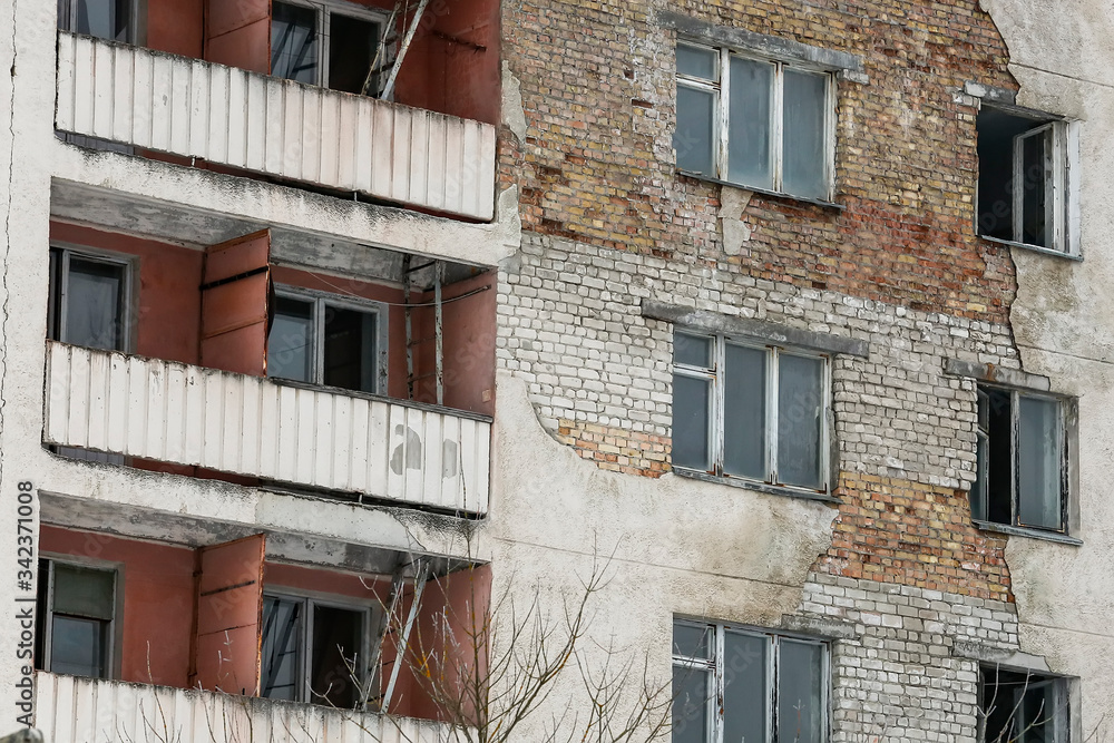 Naklejka premium Abandoned ghost town Prypiat. Overgrown trees and collapsing buildings. Pripyat, Chornobyl exclusion zone. December 2016