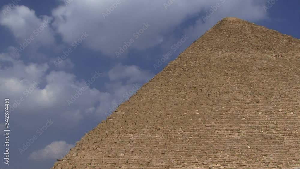 Egypt pyramids in Giza with sunny sky and clouds Egypt pyramids in Giza with sunny sky and clouds