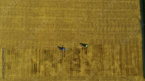 aerial view of tractor in field photo