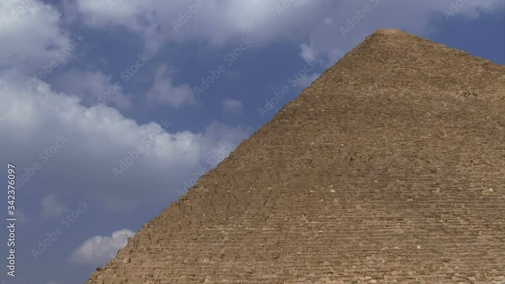 Egypt pyramids in Giza with sunny sky and clouds Egypt pyramids in Giza with sunny sky and clouds