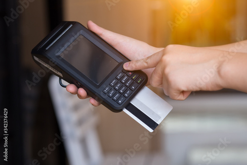 hand with credit card