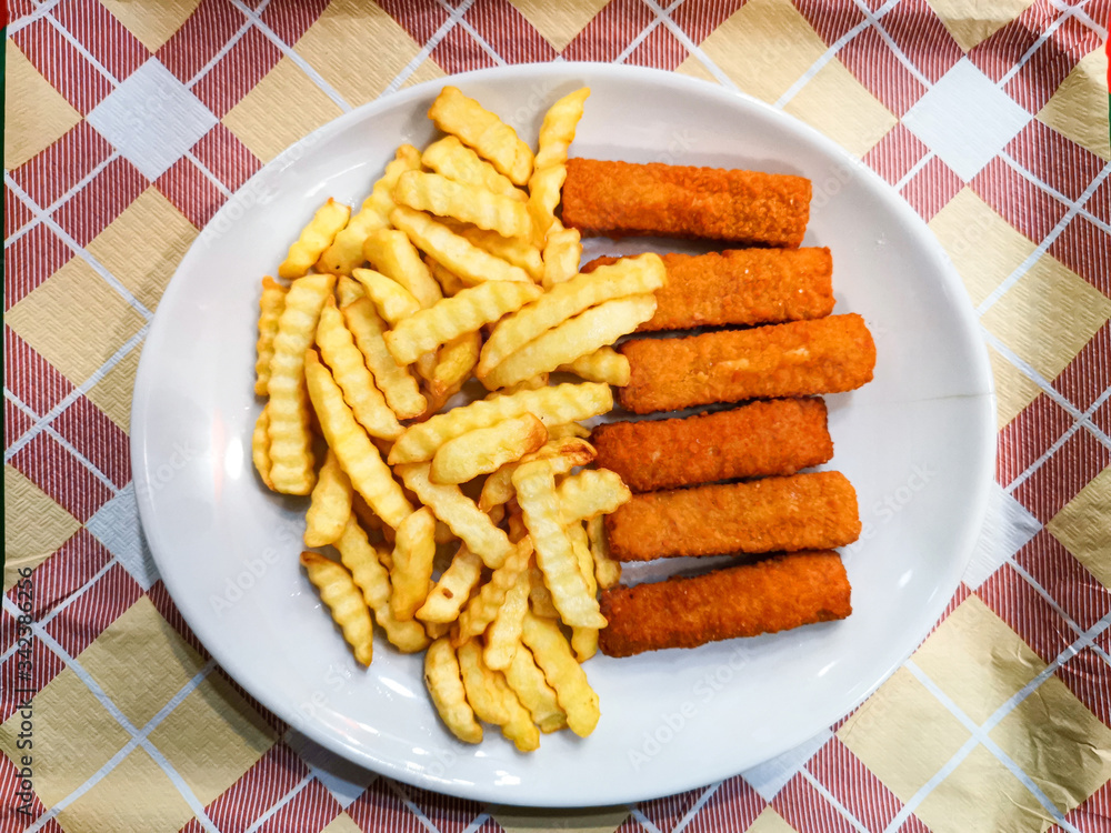 British Traditional fish and chips and tartar sauce British Traditional fish and chips and tartar sauce