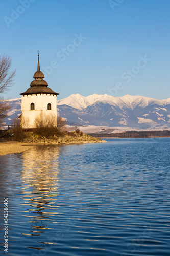 Church of Virgin Mary in Havranok and lake Liptovska Mara, district Liptovsky...