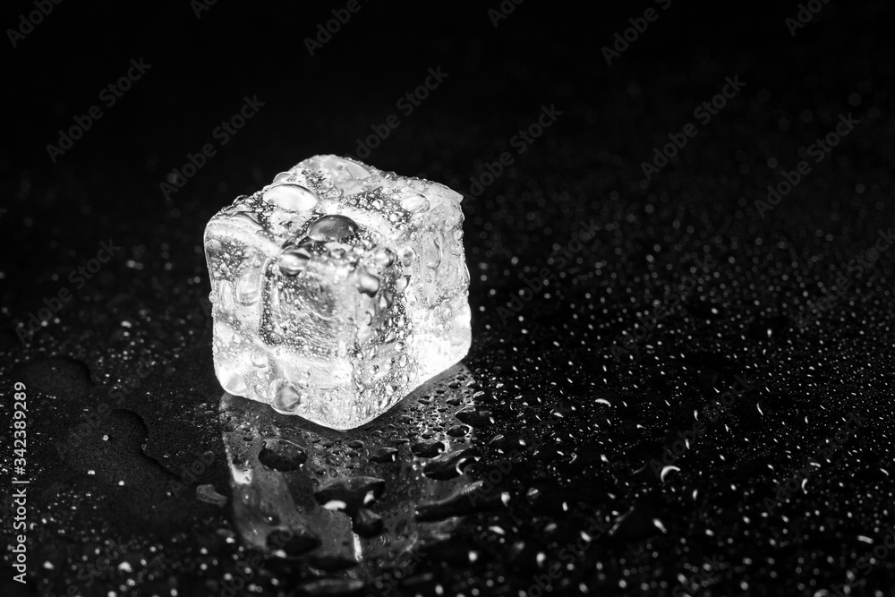 ice cubes on black table background. ice cubes on black table background.