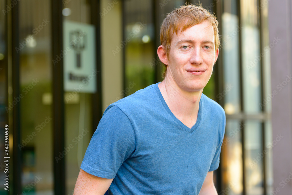 Portrait of man with red hair outdoors Portrait of man with red hair outdoors