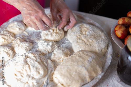 Flour dough sprinkled on a tray