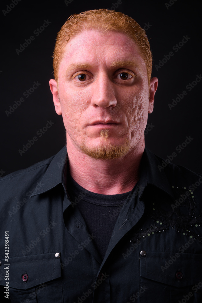 Face of muscular man with orange hair Face of muscular man with orange hair