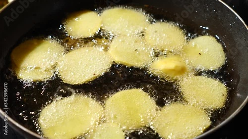 fried wegetables in oil cooking in house photo