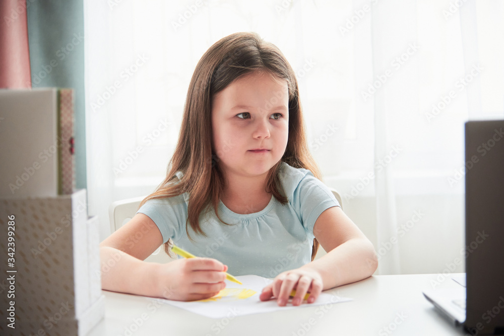 An Outbreak Of Coronavirus. Girl watch online drawing lesson. An Outbreak Of Coronavirus. Girl watch online drawing lesson.