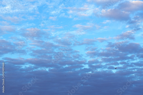 The texture of the blue sky with many beautiful clouds. © Eno1