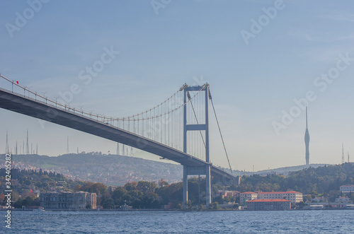 15 July Martyrs Bridge, Bosphorus bridge. famous bridge over Bosphorus Strait on sunny day against blue sky. popular tourist destination. Selective focus. Turkey, Istanbu
