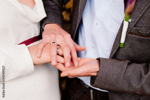 hands of the bride and groom after the engagement close-up © Petr