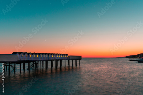 Pålsjöbaden sauna houses at sunset in Helsingborg, Sweden