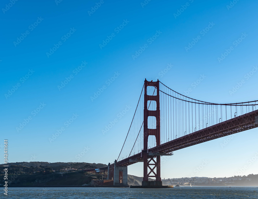Famous Golden Gate Bridge in San Francisco California USA. The Golden Gate Bridge is a suspension bridge spanning the Golden Gate connecting San Francisco bay and pacific ocean Famous Golden Gate Bridge in San Francisco California USA. The Golden Gate Bridge is a suspension bridge spanning the Golden Gate connecting San Francisco bay and pacific ocean