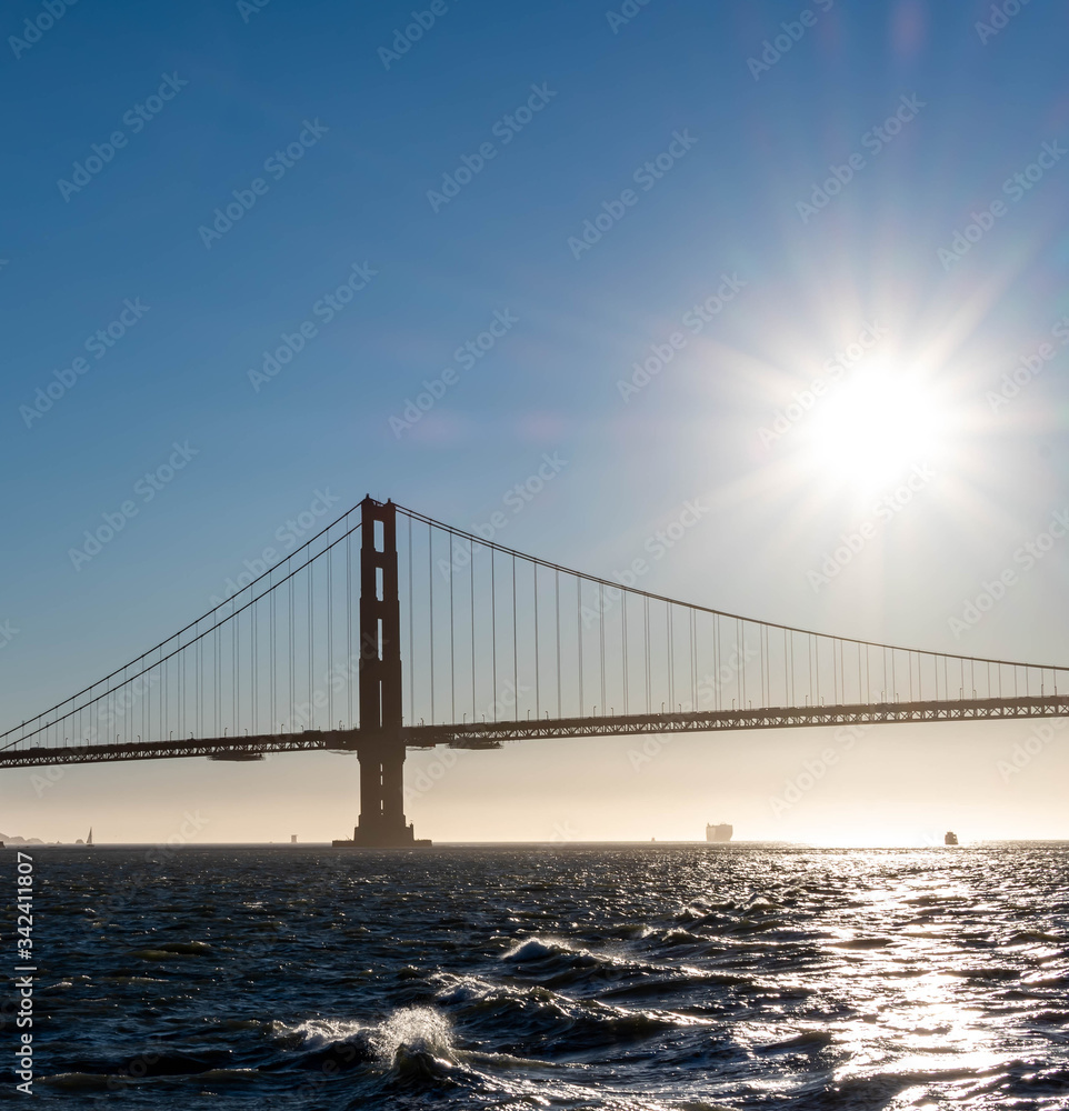 Famous Golden Gate Bridge in San Francisco California USA. The Golden Gate Bridge is a suspension bridge spanning the Golden Gate connecting San Francisco bay and pacific ocean Famous Golden Gate Bridge in San Francisco California USA. The Golden Gate Bridge is a suspension bridge spanning the Golden Gate connecting San Francisco bay and pacific ocean
