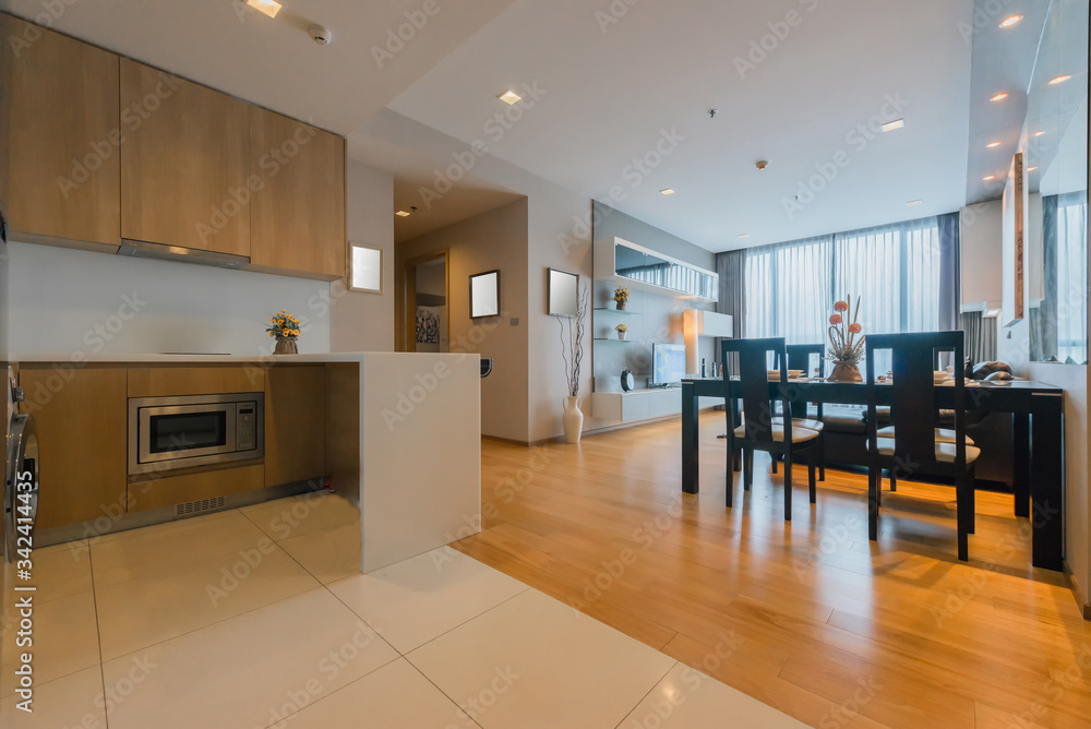 Fototapeta premium Spacious white and wooden living room with modern 