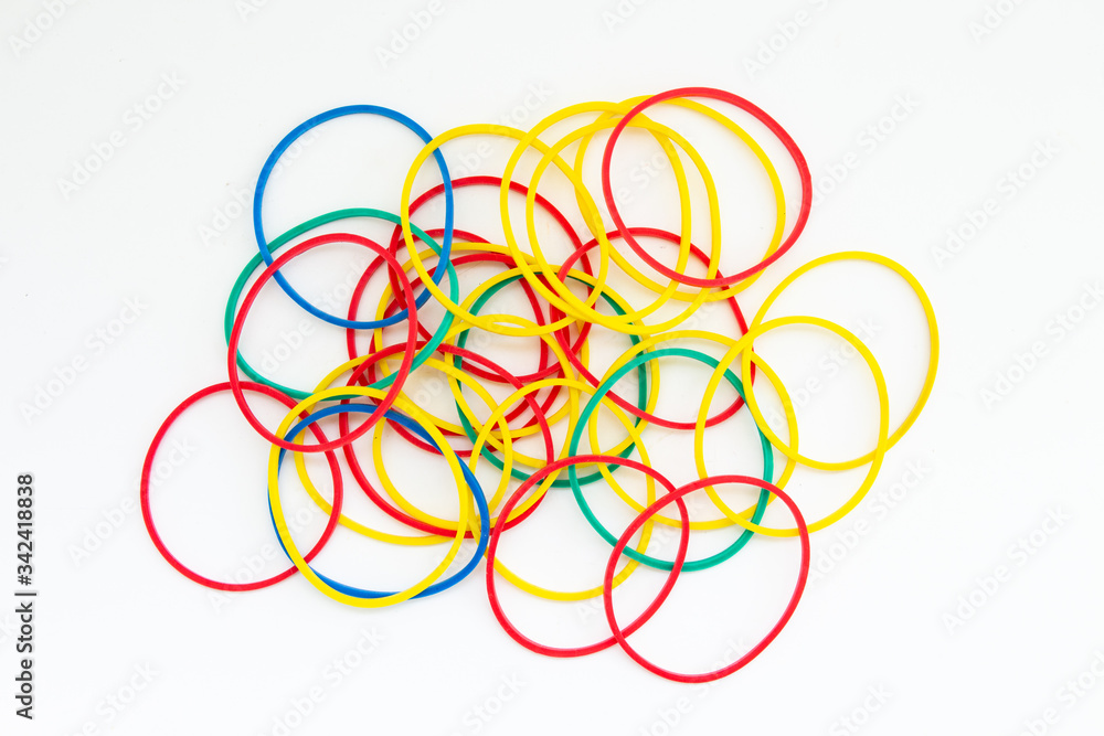 multi-colored rubber bands on a white background multi-colored rubber bands on a white background