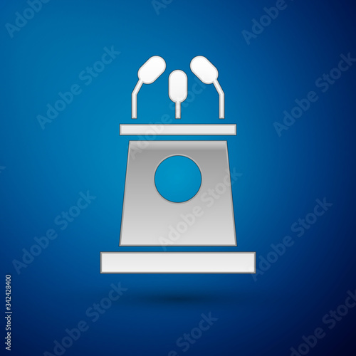 Silver Stage stand or debate podium rostrum icon isolated on blue background. Conference speech tribune.  Vector Illustration