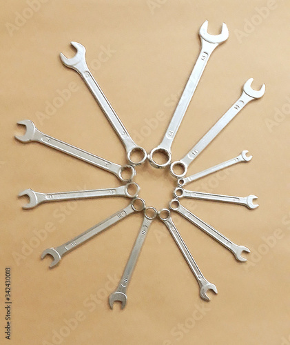 Set of various silver spanners photo