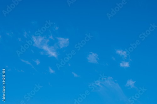 Blue sky and white clouds background © Chatree