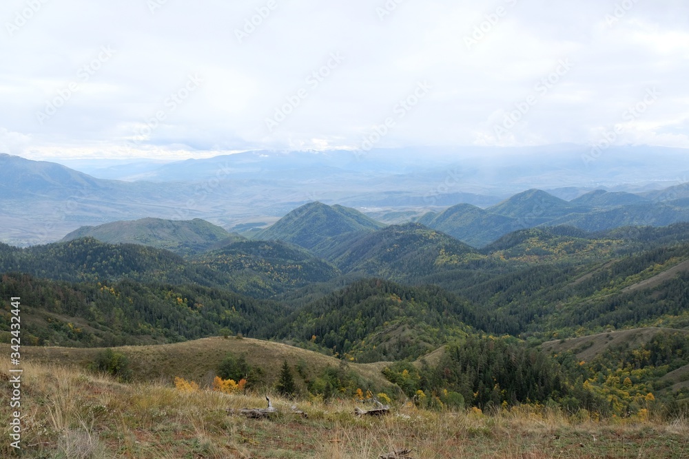 Beautiful mountain autumn views on the route from the Mt. Megruki peak to Atskuri. Borjomi-Kharagauli National Park, Borjomi, Georgia. 