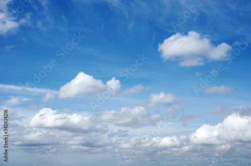 Blue sky background with white clouds    