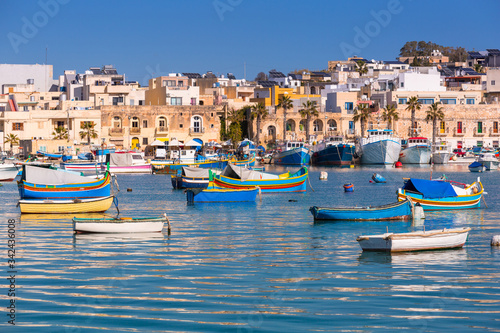 Traditional fishing boats in the Mediterranean Village of Marsaxlokk, Malta