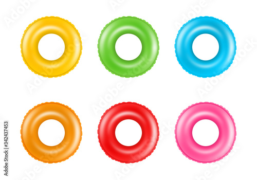  Set of colorful swimming rings. Collection of inflatable rubber rings. Floating summer toys.
