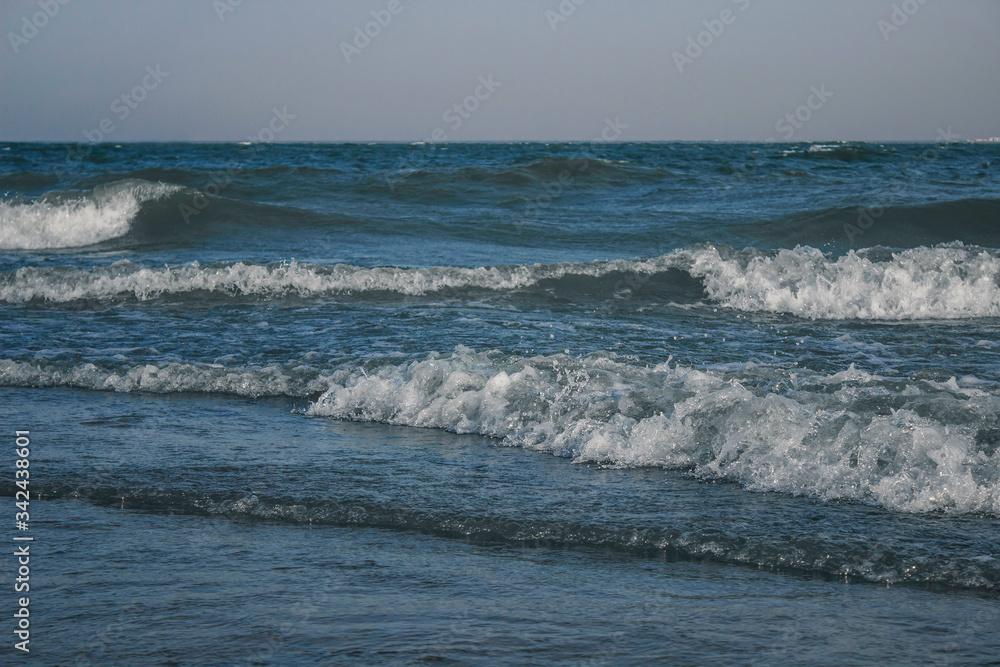 Sea waves with white foam