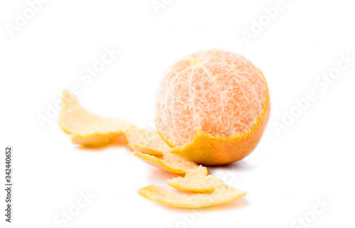 Peeled tangerine isolated on white background