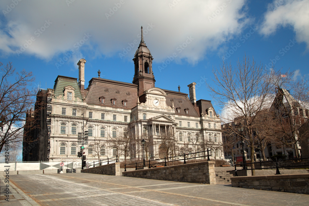 Montreal city hall with a blue cloudy sky