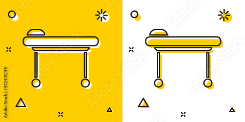 Black Stretcher icon isolated on yellow and white background. Patient hospital medical stretcher. Random dynamic shapes. Vector Illustration