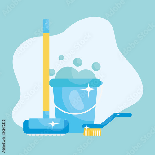 bucket with soapy water and cleaning brush and broom over blue background, colorful design