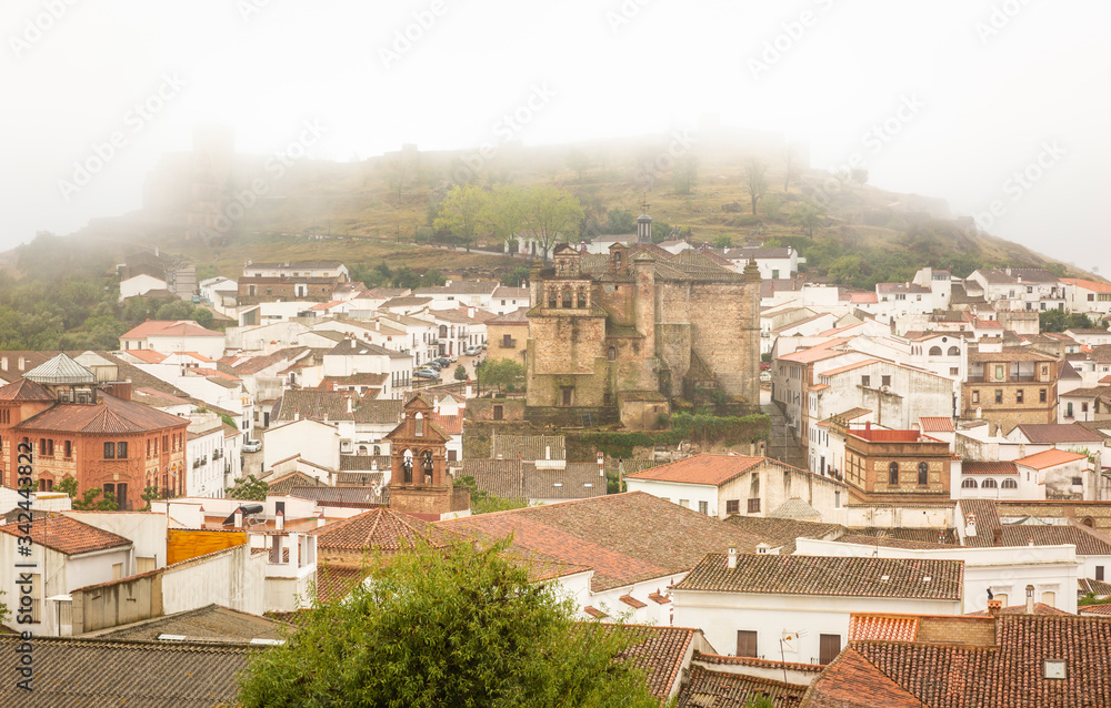 a view over Aracena city on a foggy day, province of Huelva, Andalusia, Spain