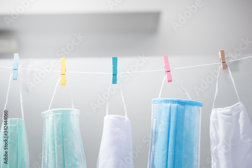surgical mask on washing line for spread protection anti bacteria and Corona virus Disease (COVID-19)