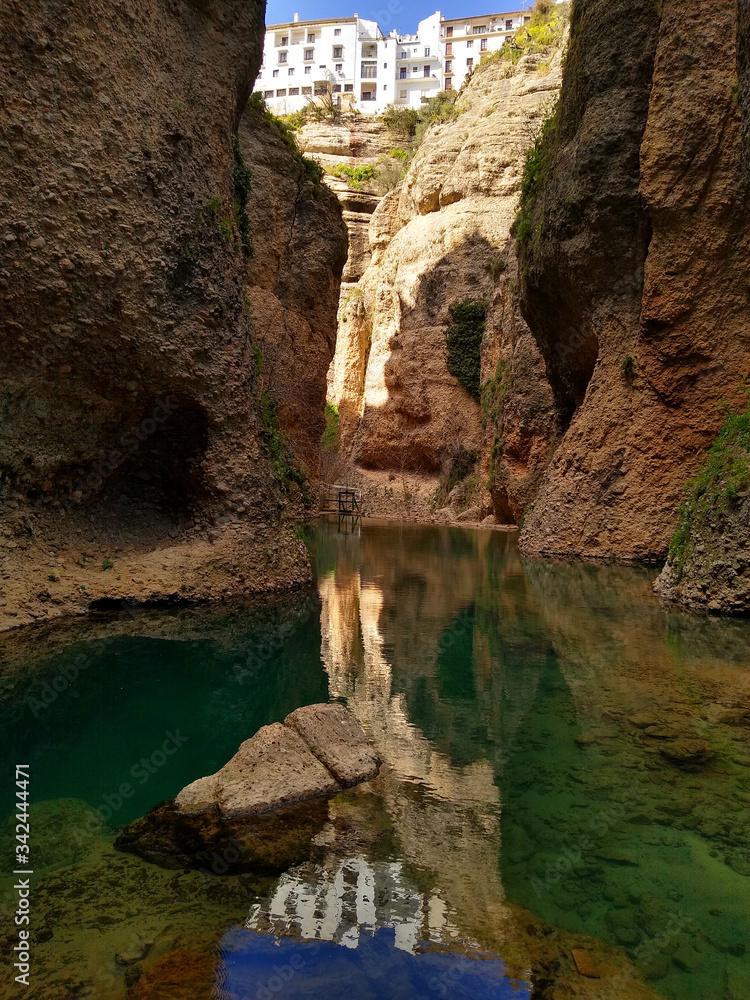 Mirror effect of the city of Ronda in the canyon of the Guadalevin River. Spain.
