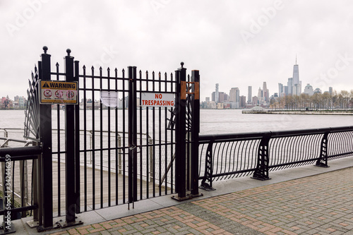 April 20 2020 - Hoboken NJ: local park is closed due to the COVID-19 Coronavirus outbreak. The parks are closed to increase social distancing and prevent people from congregating © tisaeff