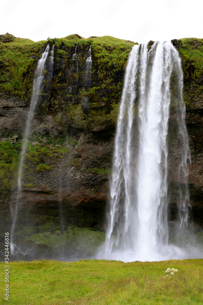 Seljalandsfoss / Iceland - August 15, 2017: Seljalandsfoss one of the most famous Icelandic waterfall, Iceland, Europe