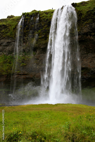 Seljalandsfoss / Iceland - August 15, 2017: Seljalandsfoss one of the most famous Icelandic waterfall, Iceland, Europe