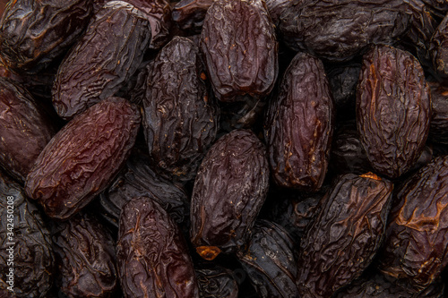 Big sicilian dried dates as a background