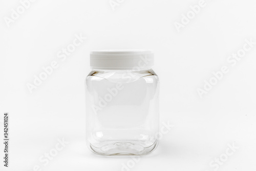 Fototapeta empty transparent plastic jar