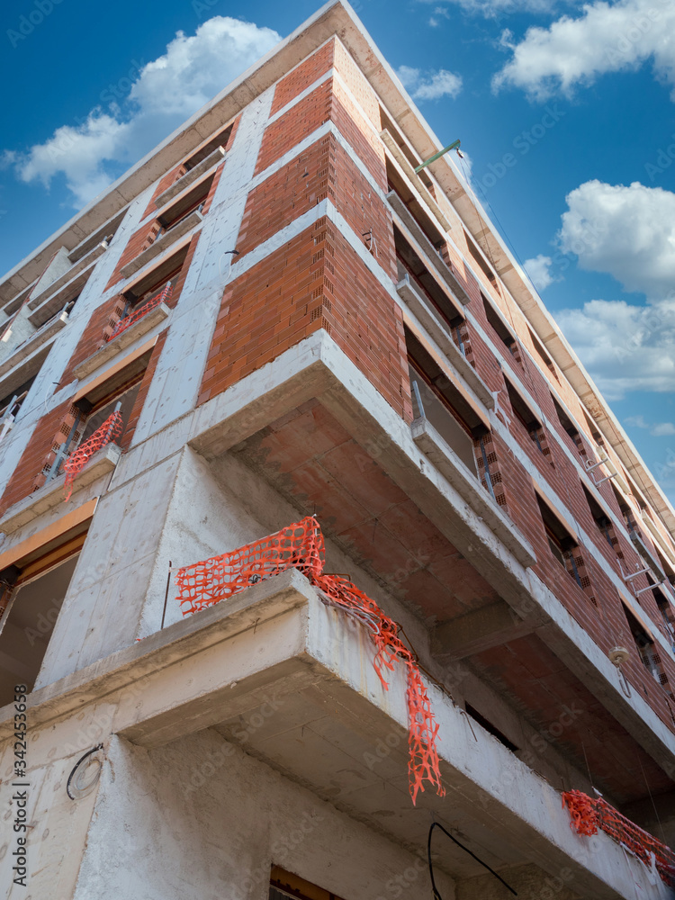 View of Building an apartment at summer day background.