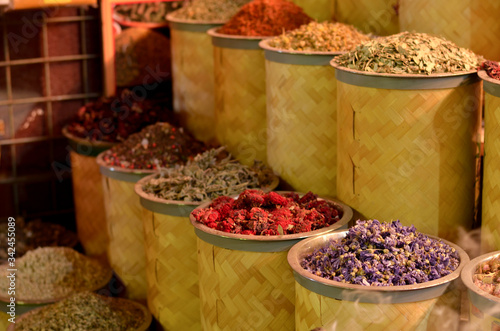 Rows & heaps of aromatic spices & herbs on display at the famous Spice Souk market in Baniyas Street, in locality of Al Ras, Deira, Dubai adjacent to the Gold Souk. It's a famous tourist destination