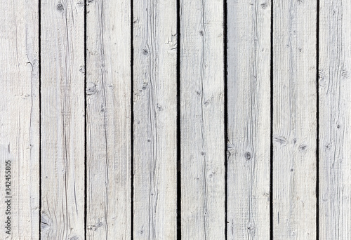 Backgroud of aged natural light old wood fence texture. Horizontal orientation. Top view