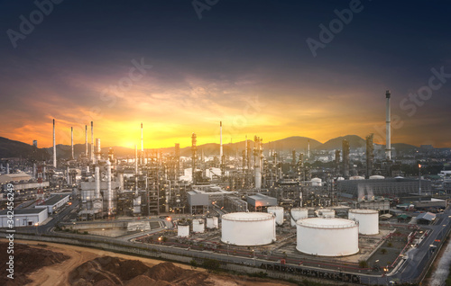 Aerial view Oil and gas refinery industrial zone on sunset time and twilight sky,Thailand