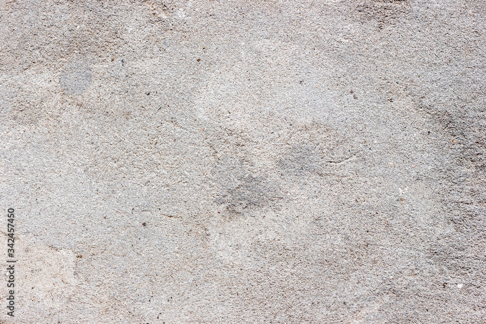 Old gray concrete slab close up. Natural stone surface.