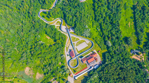 Beautiful panoramic aerial view photo from flying drone on Sigulda Bobsleigh and Luge Track in summer. Sigulda, Latvija (series)