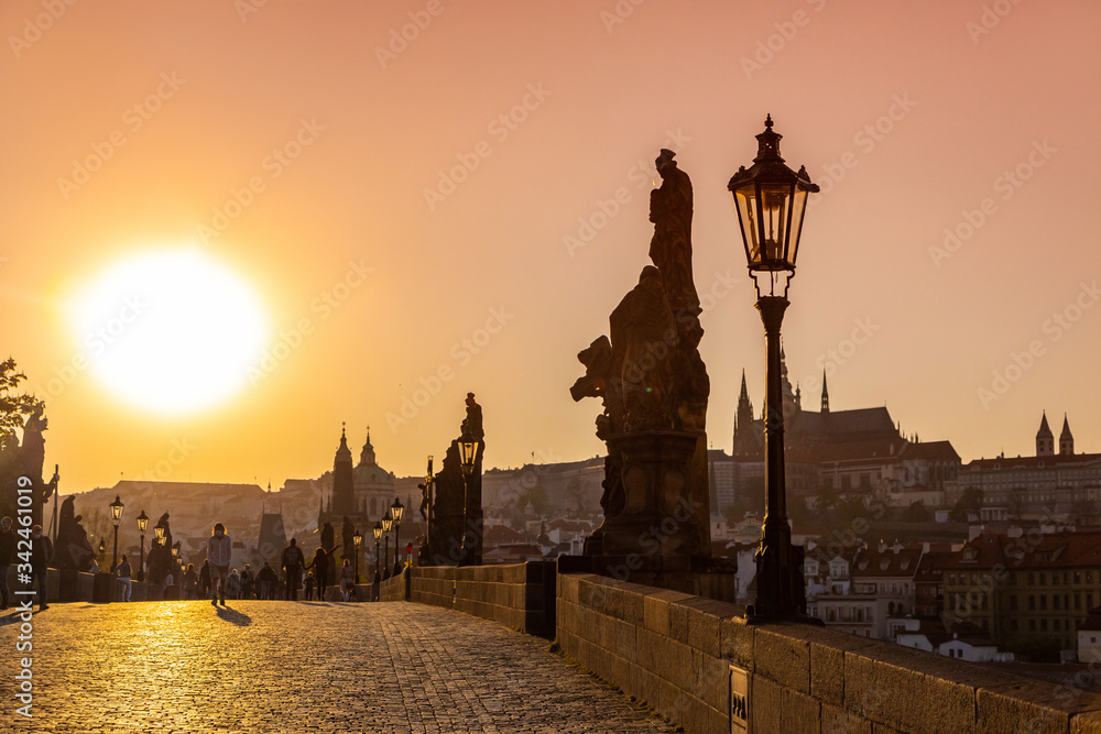 Charles Bridge in Prague at sunset in the coronavirus pandemic