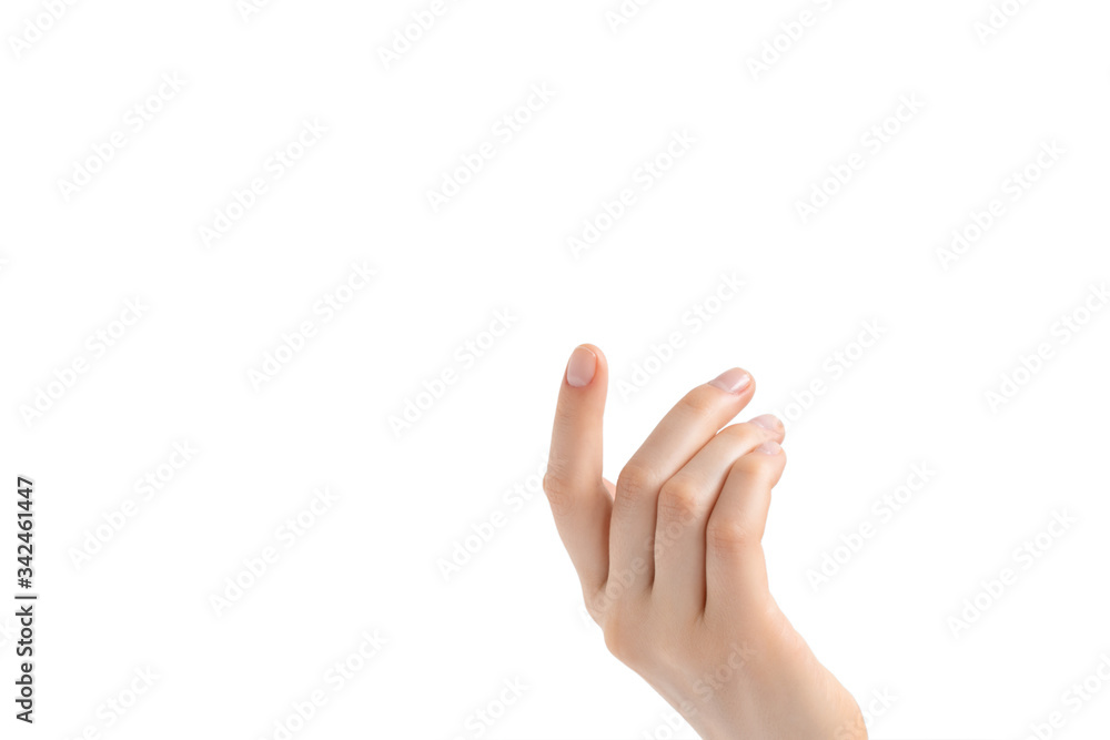 Beautiful female hand with natural manicure pointing up, colorless nail polish. Isolated on white background. Beautiful female hand with natural manicure pointing up, colorless nail polish. Isolated on white background.